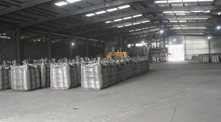 A large quantity of activated carbon is stored in the warehouse.